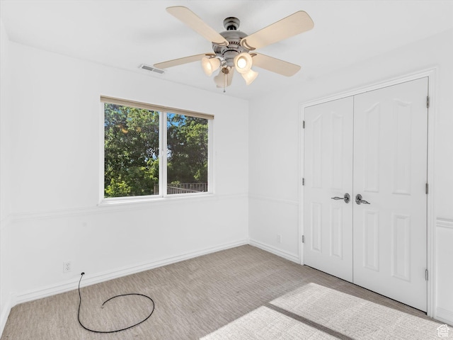3351 E Deer Hollow Cir S, Sandy, UT 84092 - unfurnished bedroom with a closet, baseboards, carpet, and a ceiling fan