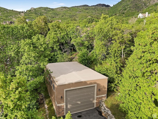 3351 E Deer Hollow Cir S, Sandy, UT 84092 - drone / aerial view of a mountain backdrop and a forest