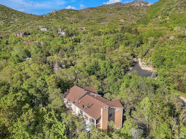 3351 E Deer Hollow Cir S, Sandy, UT 84092 - view of subject property with a heavily wooded area and a mountainous background