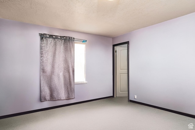544 E 1875 S, Roosevelt, UT 84066 - spare room featuring baseboards and a textured ceiling