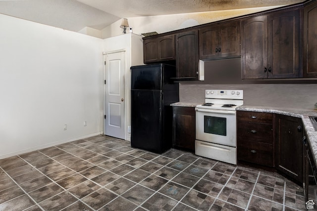 544 E 1875 S, Roosevelt, UT 84066 - kitchen with freestanding refrigerator, white range with electric cooktop, dark brown cabinets, vaulted ceiling, and light countertops