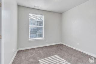 303 W 435 N, Vineyard, UT 84059 - carpeted empty room with baseboards
