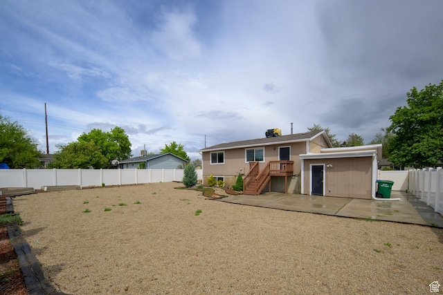 7648 S 2290 W, West Jordan, UT 84084 - back of property with a patio and a fenced backyard