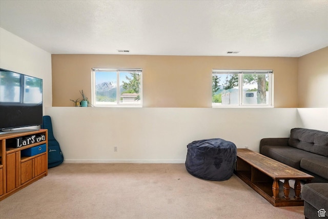 211 S 300 E, Wellsville, UT 84339 - living room with healthy amount of natural light and light carpet