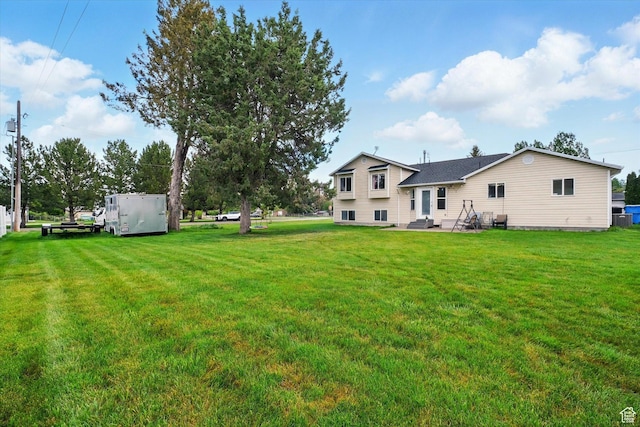 211 S 300 E, Wellsville, UT 84339 - view of grassy yard with a patio area