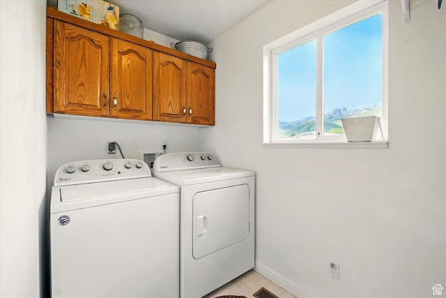 211 S 300 E, Wellsville, UT 84339 - washroom featuring cabinet space, independent washer and dryer, and baseboards