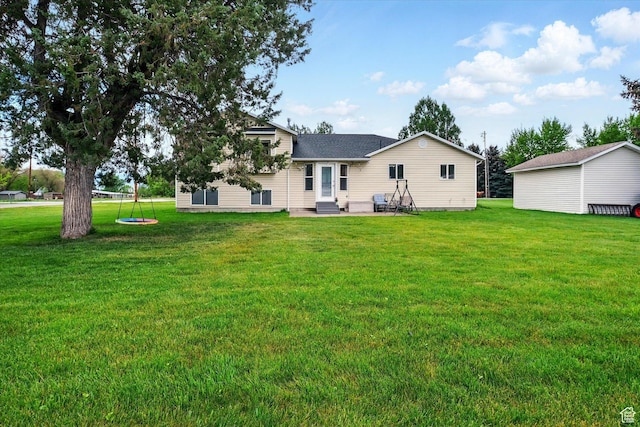 211 S 300 E, Wellsville, UT 84339 - back of property with a yard and a patio area