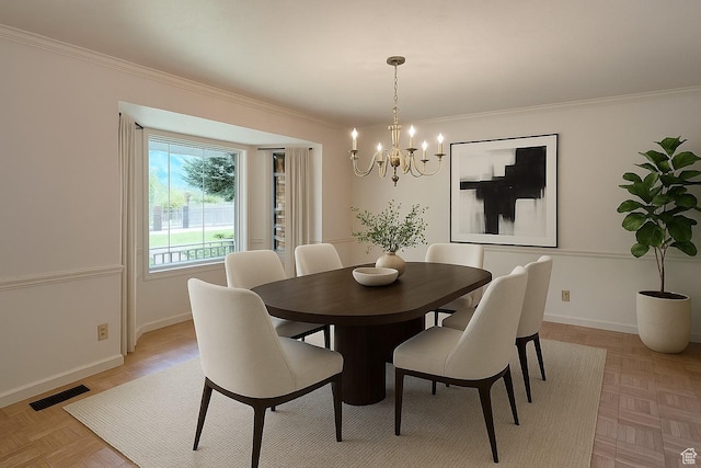 11258 S Brandon Park Dr E, Sandy, UT 84092 - dining area featuring a chandelier, crown molding, and baseboards