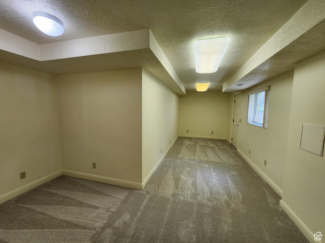 11258 S Brandon Park Dr E, Sandy, UT 84092 - basement with a textured ceiling, carpet flooring, and baseboards