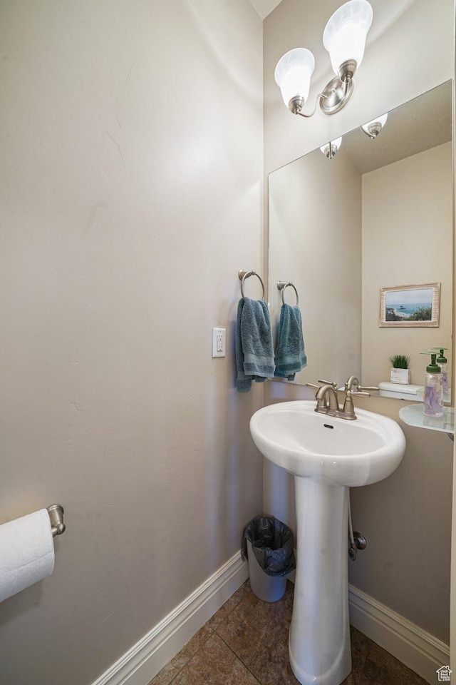 607 N 1980 E Unit 139, Spanish Fork, UT 84660 - bathroom with baseboards, tile patterned flooring, and a sink