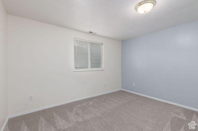 540 N 100 E, Hyde Park, UT 84318 - carpeted spare room with baseboards and a textured ceiling