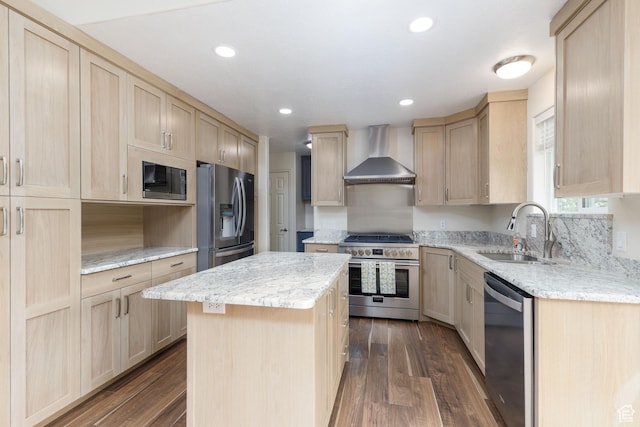 540 N 100 E, Hyde Park, UT 84318 - kitchen with appliances with stainless steel finishes, wall chimney range hood, a sink, light brown cabinetry, and dark wood-style floors