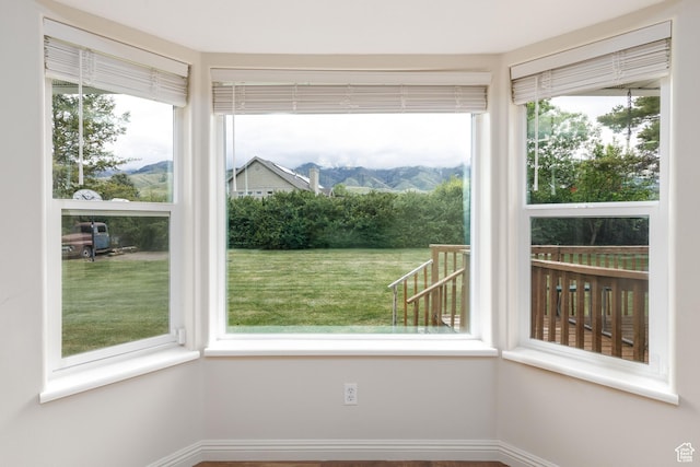 540 N 100 E, Hyde Park, UT 84318 - unfurnished sunroom with plenty of natural light and a mountain view