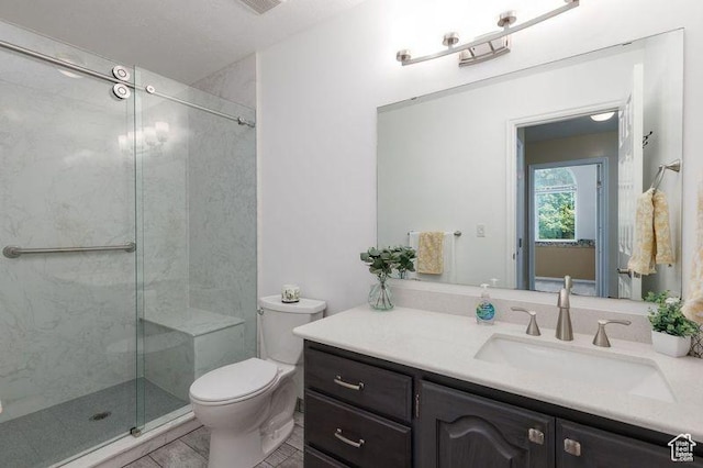 540 N 100 E, Hyde Park, UT 84318 - full bath with a stall shower, vanity, toilet, and tile patterned floors