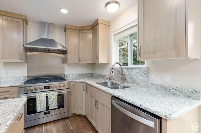 540 N 100 E, Hyde Park, UT 84318 - kitchen featuring appliances with stainless steel finishes, wall chimney exhaust hood, a sink, and light brown cabinetry