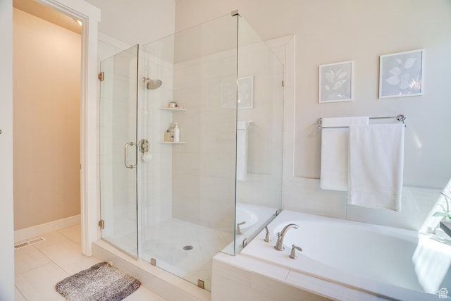 2700 E Red Barn Rd S, Heber City, UT 84032 - bathroom with a garden tub, a stall shower, and tile patterned floors
