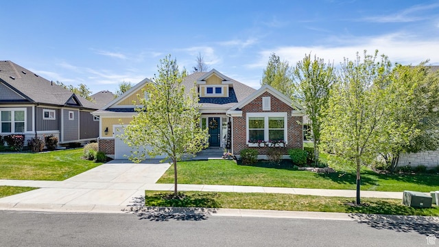 2700 E Red Barn Rd S, Heber City, UT 84032 - craftsman-style home with a garage, concrete driveway, a front yard, and brick siding