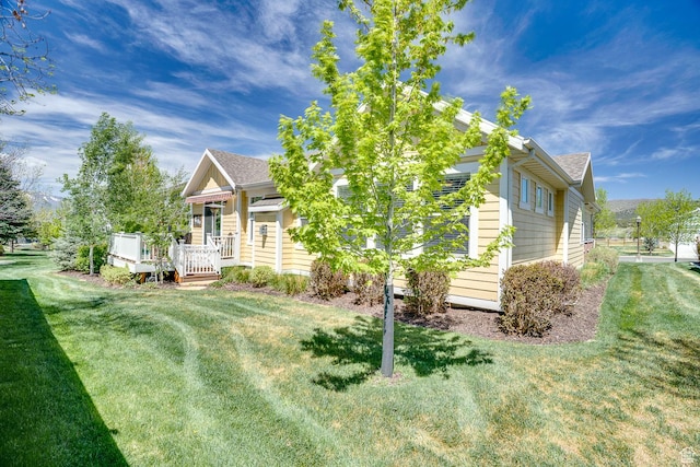 2700 E Red Barn Rd S, Heber City, UT 84032 - view of side of home featuring a lawn, a deck, and a shingled roof