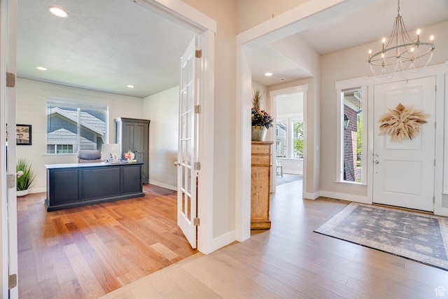 2700 E Red Barn Rd S, Heber City, UT 84032 - foyer featuring light wood-style floors, a chandelier, baseboards, recessed lighting, and french doors
