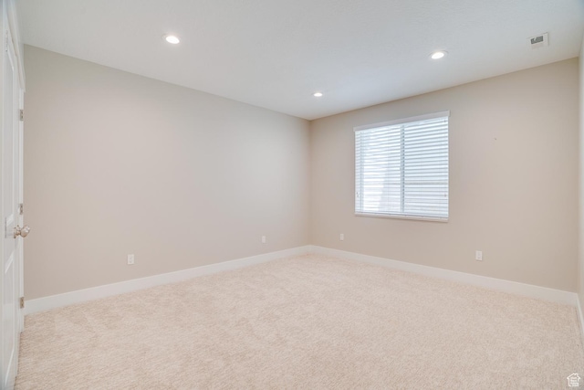 2700 E Red Barn Rd S, Heber City, UT 84032 - empty room featuring light colored carpet, baseboards, and recessed lighting