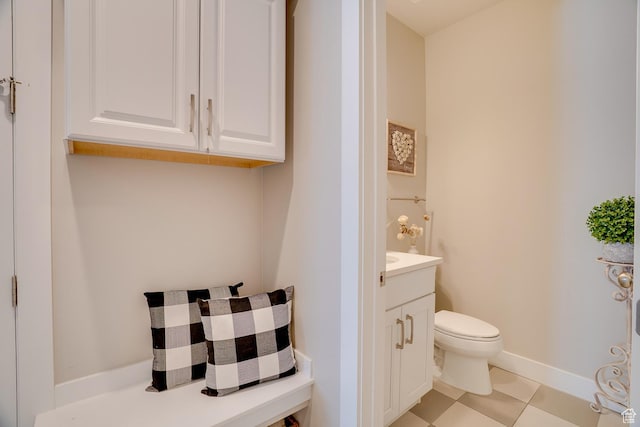 2700 E Red Barn Rd S, Heber City, UT 84032 - bathroom featuring toilet, vanity, tile patterned floors, and baseboards