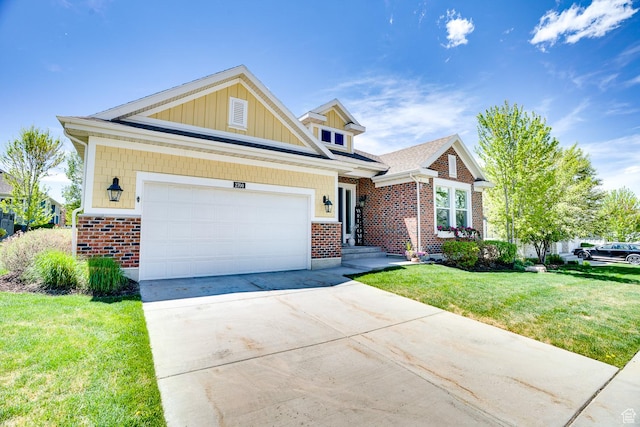 2700 E Red Barn Rd S, Heber City, UT 84032 - craftsman-style home featuring brick siding, a front lawn, driveway, an attached garage, and board and batten siding