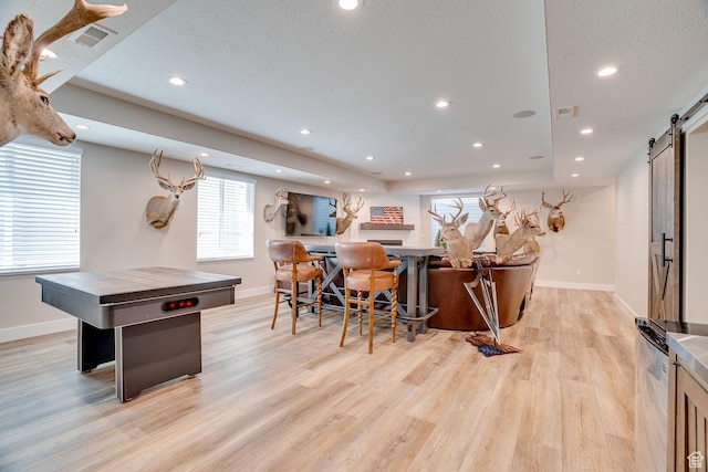 2700 E Red Barn Rd S, Heber City, UT 84032 - bar with a barn door, baseboards, light wood-type flooring, healthy amount of natural light, and recessed lighting