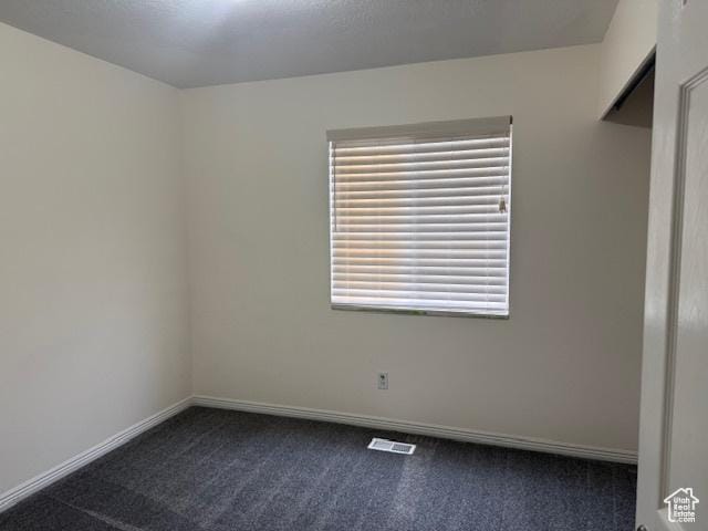 4327 S Westlake W, Roy, UT 84067 - empty room featuring dark carpet and baseboards