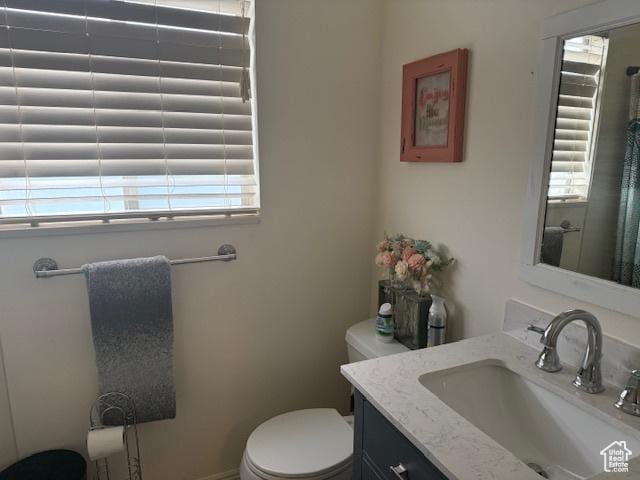 4327 S Westlake W, Roy, UT 84067 - full bath with healthy amount of natural light, toilet, and vanity