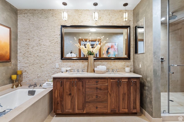bathroom with a shower stall, a bath, tile patterned flooring, and double vanity