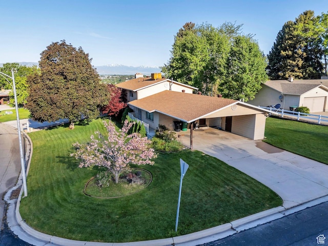 3165 N Bannock Dr E, Provo, UT 84604 - view of front of property featuring concrete driveway, a carport, and a shingled roof