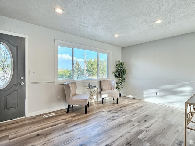 521 N 2400 W, Vernal, UT 84078 - foyer with a textured ceiling, wood finished floors, baseboards, and recessed lighting