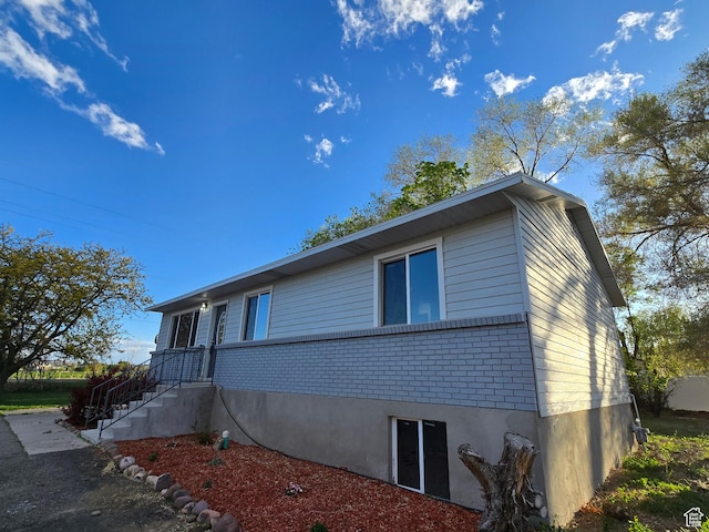 521 N 2400 W, Vernal, UT 84078 - view of side of home with brick siding