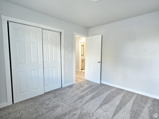 521 N 2400 W, Vernal, UT 84078 - unfurnished bedroom featuring carpet flooring, baseboards, and a closet