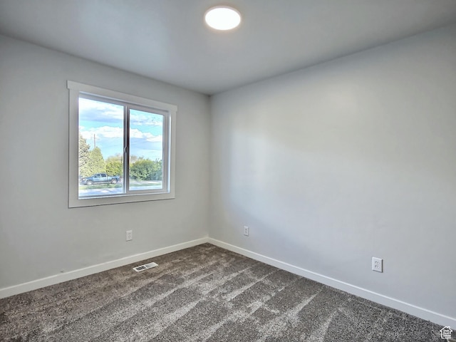 521 N 2400 W, Vernal, UT 84078 - unfurnished room with baseboards and dark carpet