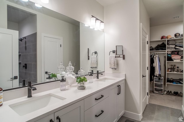 2165 W 380 S, Hurricane, UT 84737 - full bath featuring double vanity, a walk in closet, and a tile shower
