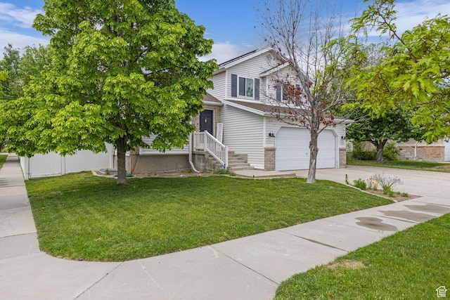 5884 S Impressions Dr W, Salt Lake City, UT 84118 - view of front of property with driveway, a front yard, and a garage