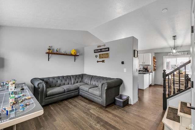 5884 S Impressions Dr W, Salt Lake City, UT 84118 - living area featuring dark wood-style floors and vaulted ceiling