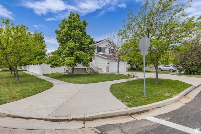 5884 S Impressions Dr W, Salt Lake City, UT 84118 - obstructed view of property with a garage, solar panels, and driveway