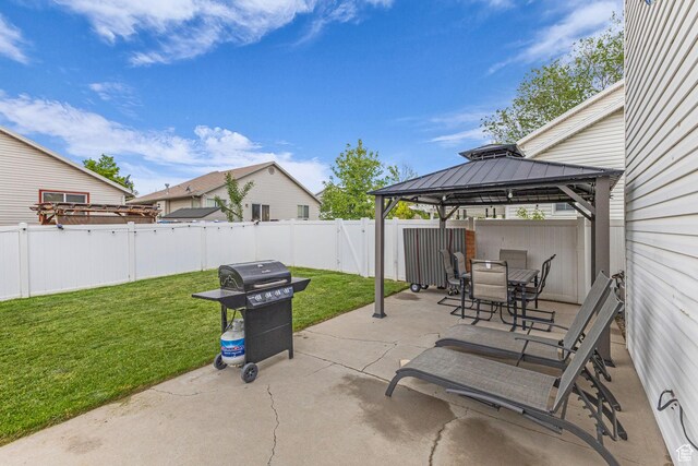 5884 S Impressions Dr W, Salt Lake City, UT 84118 - view of patio with a gazebo, outdoor dining area, and area for grilling