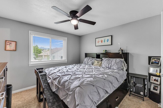 5884 S Impressions Dr W, Salt Lake City, UT 84118 - bedroom featuring carpet floors, baseboards, and ceiling fan