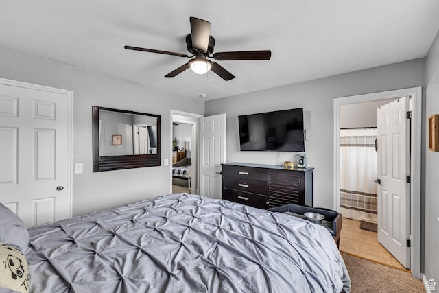 5884 S Impressions Dr W, Salt Lake City, UT 84118 - bedroom with light tile patterned floors and a ceiling fan