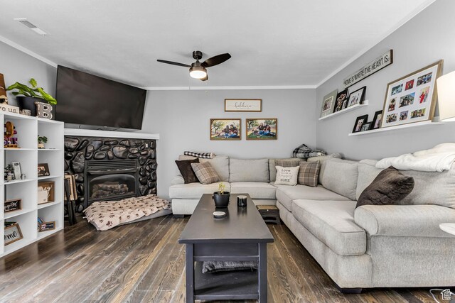 5884 S Impressions Dr W, Salt Lake City, UT 84118 - living room featuring crown molding, ceiling fan, dark wood-style flooring, and a stone fireplace