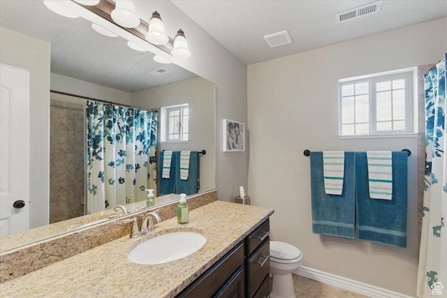 full bathroom with toilet, vanity, tile patterned flooring, curtained shower, and baseboards