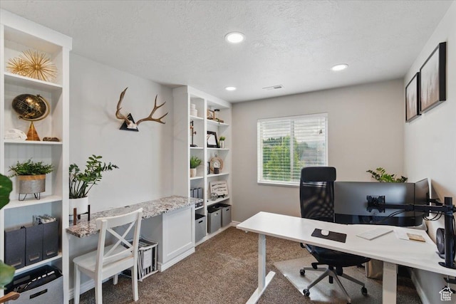 carpeted home office featuring a textured ceiling and recessed lighting