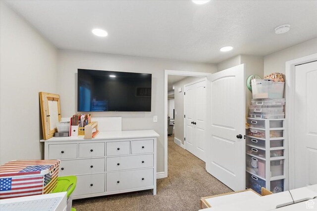 game room with light colored carpet and recessed lighting