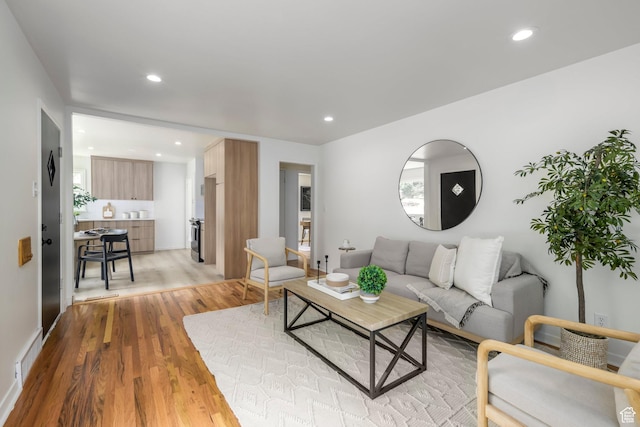 3671 Eccles Ave, Ogden, UT 84403 - living room featuring light wood-style floors and recessed lighting