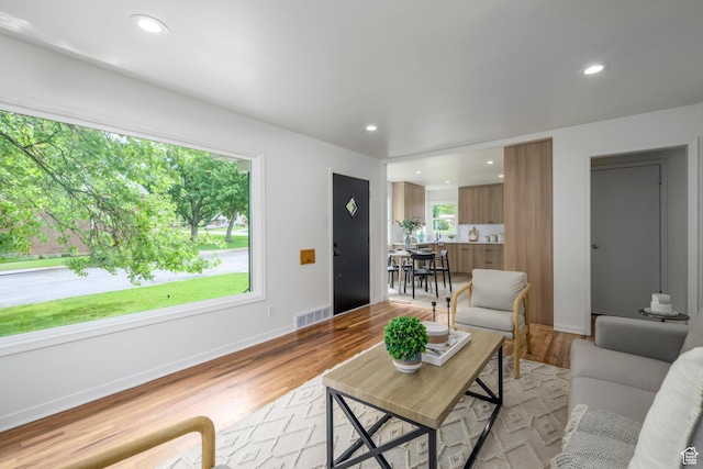 3671 Eccles Ave, Ogden, UT 84403 - living room with light wood-style flooring, recessed lighting, and baseboards