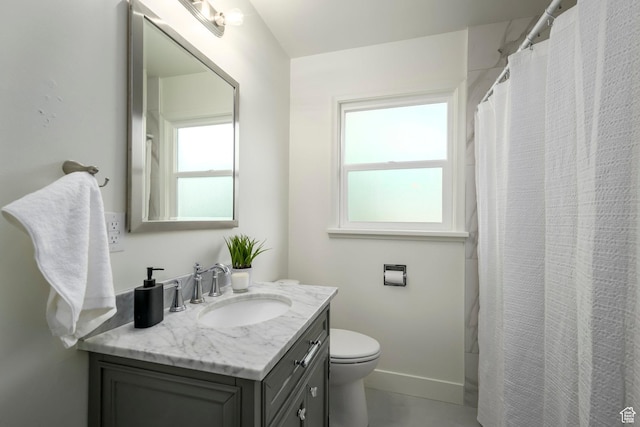 3671 Eccles Ave, Ogden, UT 84403 - bathroom with vanity, toilet, and baseboards