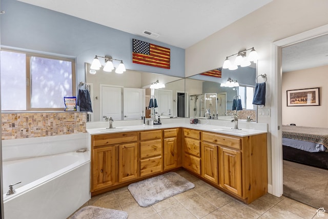 881 W Smithsonian Way, Apple Valley, UT 84737 - ensuite bathroom with a garden tub, double vanity, tile patterned flooring, and a shower stall